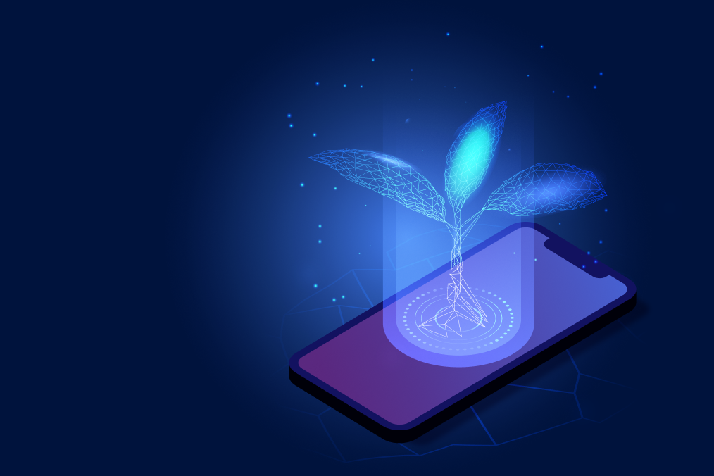 Telefon na którym znajduje się hologram cyfrowego drzewa